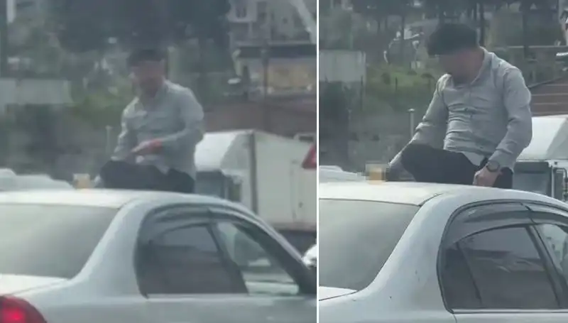 Trafikte Yılın Olayı: Otomobilin Üzerinde Eğlence Dolu Alem!